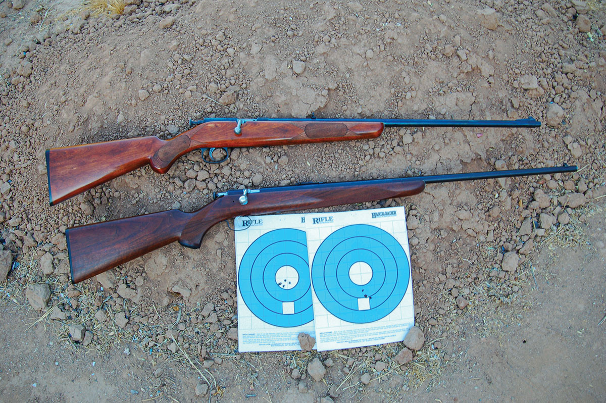 Completed project guns. A Sears, Roebuck & Co. Ranger (top) and a Winchester M67 (below) look like more expensive guns. They shoot well too, as targets from 25 yards show.